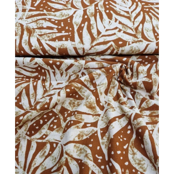 Tissu Viscose fond brun/bordeau avec feuilles